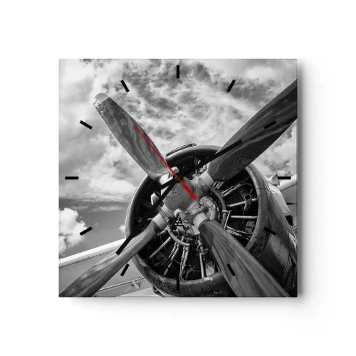 Wanduhr - Glasuhr - Ein Schwarzweißfoto eines Flugzeugpropellers vor einem dynamischen Himmel. - 30x30cm - Eroberer der Lüfte - Moderne Wanddekoration für Wohnzimmer und Schlafzimmer ARTTOR
