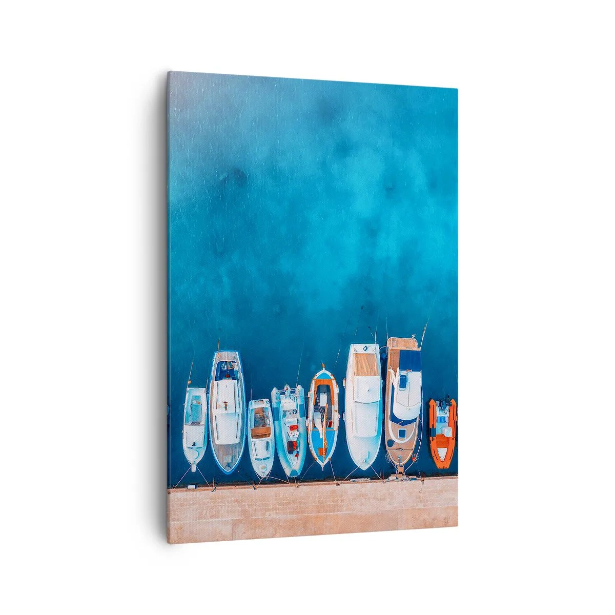 Bild auf Leinwand - Leinwandbild - Boote vertäut am Ufer vor dem blauen Wasser - 70x100cm - In einer Reihe - Moderne Wanddekoration für Wohnzimmer und Schlafzimmer ARTTOR