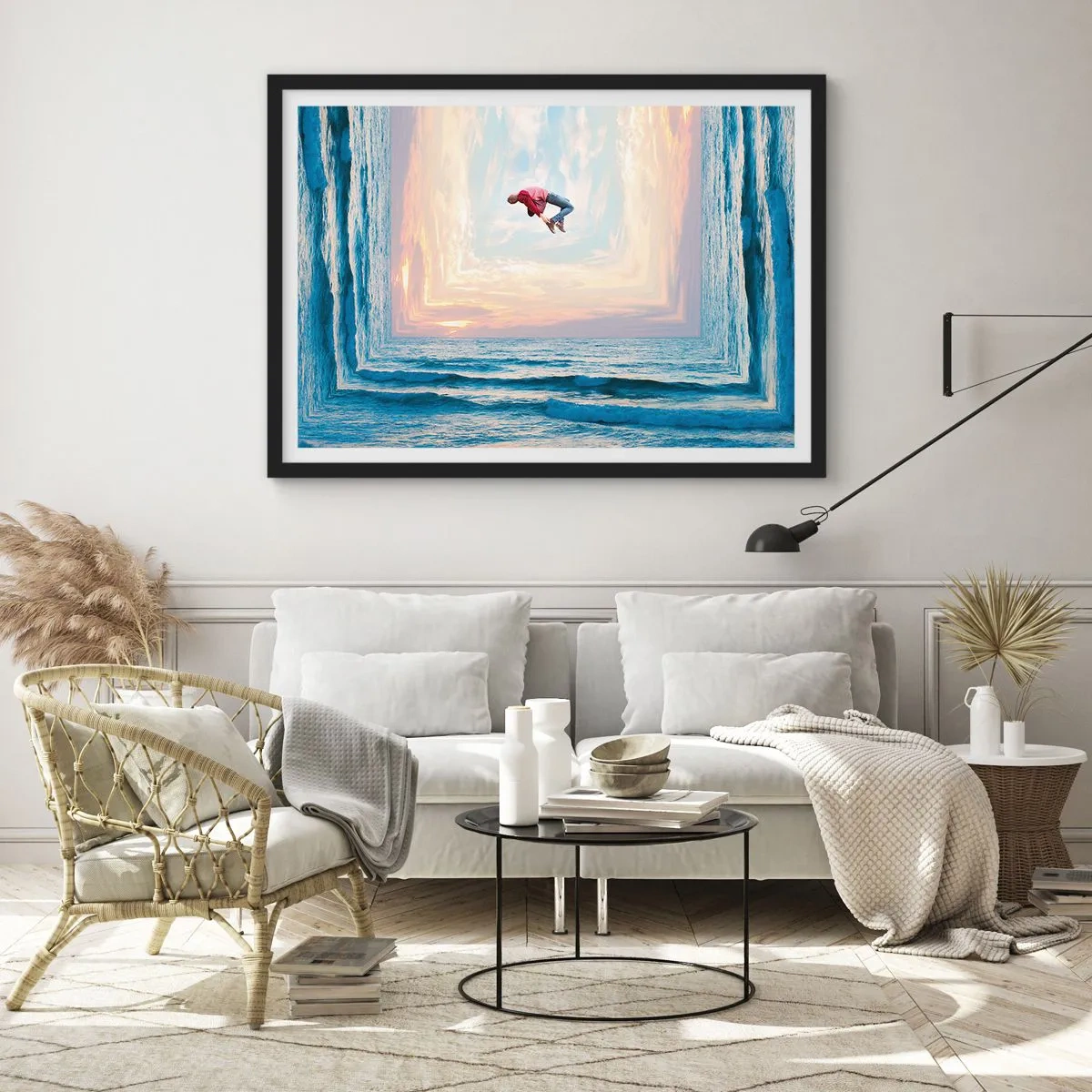 Poster in einem schwarzem Rahmen - Surrealer Sprung über das Meer im Rahmen - 70x50cm - In eine andere Dimension - Moderne Wanddekoration für Wohnzimmer und Schlafzimmer ARTTOR
