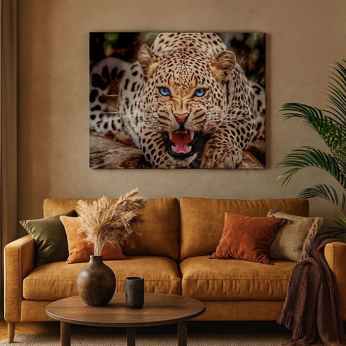Bild auf Leinwand - Leinwandbild - Ein bedrohlicher Leopard mit intensiv blauen Augen - 70x50cm - Schönheitswut tut nicht weh - Moderne Wanddekoration für Wohnzimmer und Schlafzimmer ARTTOR