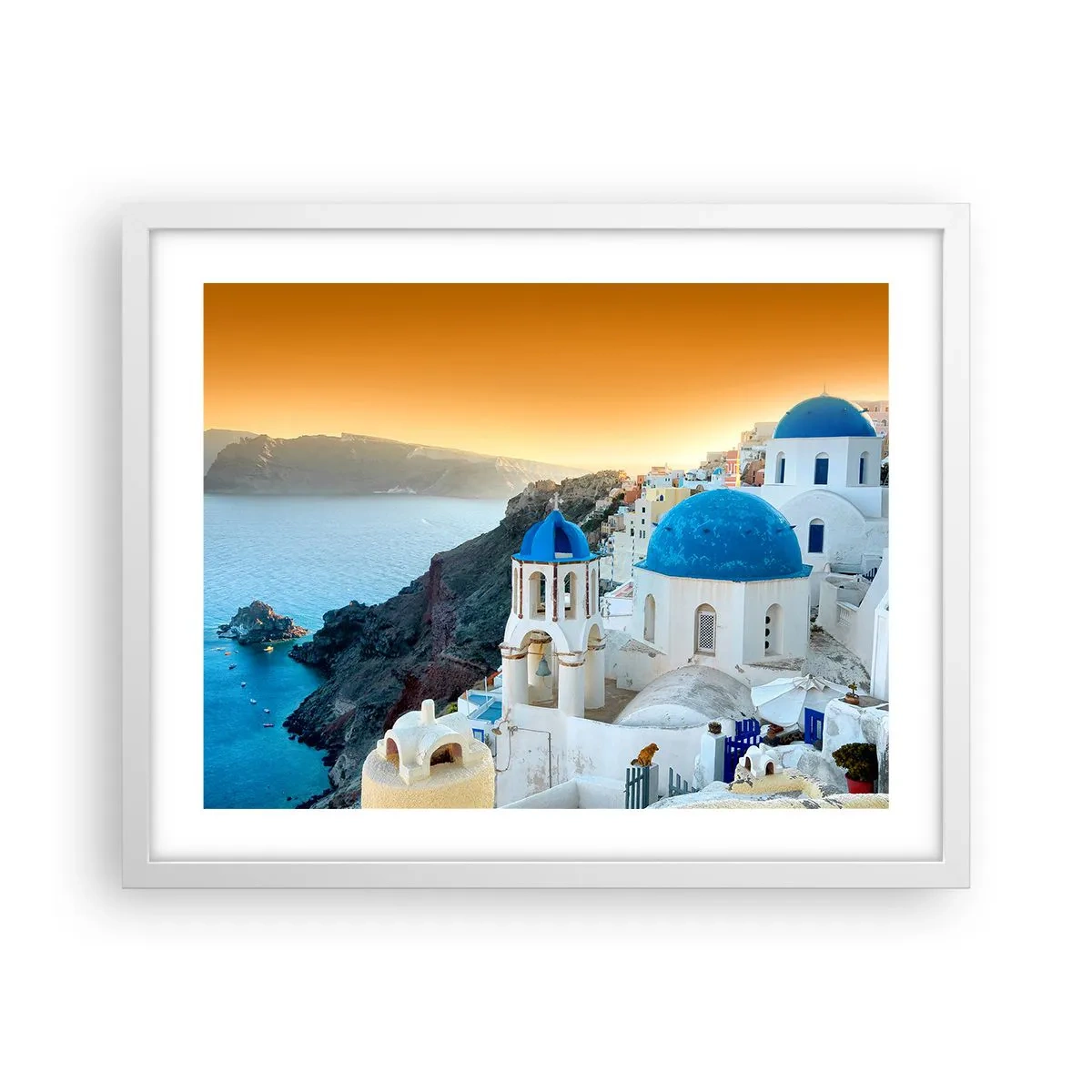 Poster in einem weißen Rahmen - Santorini - an die Felsen gekuschelt - 50x40 cm