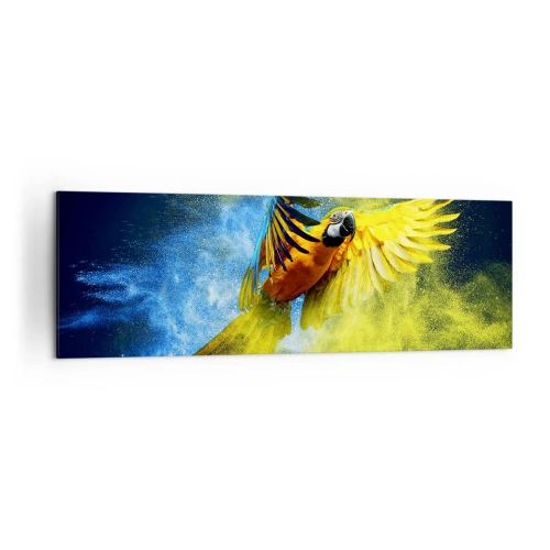 Bild auf Leinwand - Leinwandbild - Ein Papagei im Flug vor einem Hintergrund aus farbenfrohen Explosionen in Gelb und Blau. - 160x50cm - Im blauen und goldenen Staub - Moderne Wanddekoration für Wohnzimmer und Schlafzimmer ARTTOR
