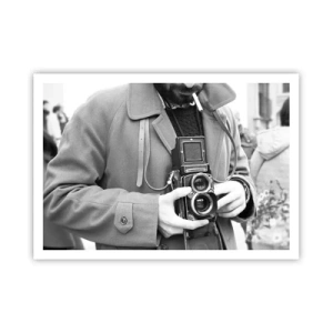 Poster - Schwarz-Weiß-Foto eines Mannes mit einer Retro-Kamera - 100x70cm - Retro-Stil - Moderne Wanddekoration für Wohnzimmer und Schlafzimmer ARTTOR