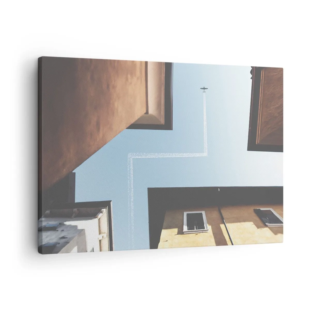 Bild auf Leinwand - Leinwandbild - Blick auf das Flugzeug und seine Spur am Himmel aus der Straßenperspektive - 70x50cm - Über dem Stadtlabyrinth - Moderne Wanddekoration für Wohnzimmer und Schlafzimmer ARTTOR