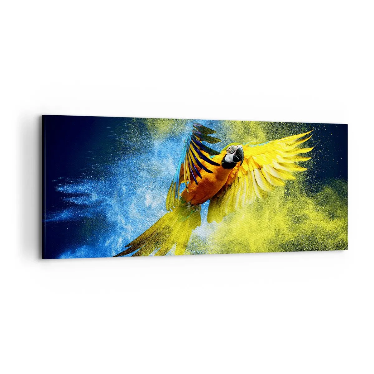 Bild auf Leinwand - Leinwandbild - Ein Papagei im Flug vor einem Hintergrund aus farbenfrohen Explosionen in Gelb und Blau. - 120x50cm - Im blauen und goldenen Staub - Moderne Wanddekoration für Wohnzimmer und Schlafzimmer ARTTOR