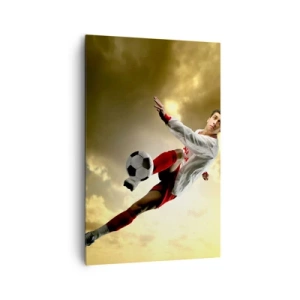 Bild auf Leinwand - Leinwandbild - Ein Fußballspieler in einem dynamischen Sprung kickt den Ball in den Himmel - 80x120cm - Fußballhimmel - Moderne Wanddekoration für Wohnzimmer und Schlafzimmer ARTTOR