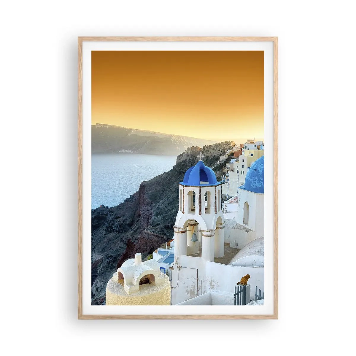 Poster in einem Rahmen aus heller Eiche - Santorini - an die Felsen gekuschelt - 70x100 cm