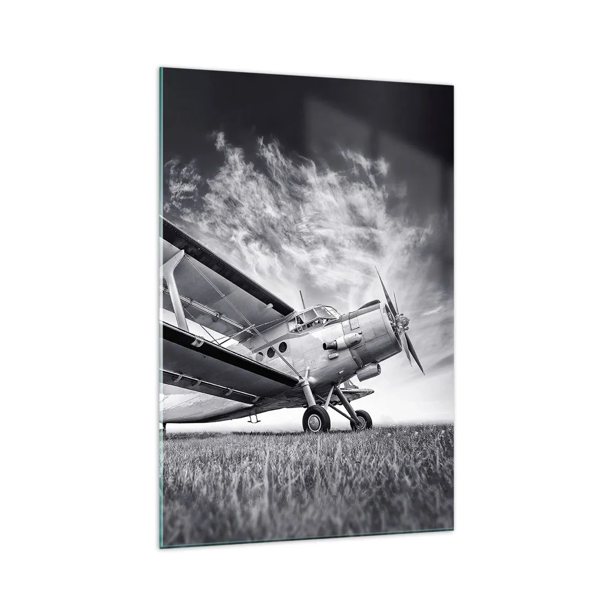 Glasbild - Bild auf glas - Ein Flugzeug vor einem dramatischen Himmel in Schwarzweiß - 70x100cm - Der geflügelte Wanderer - Moderne Wanddekoration für Wohnzimmer und Schlafzimmer ARTTOR