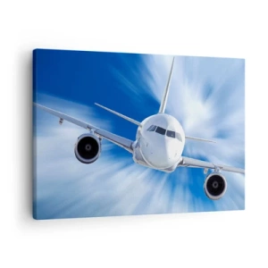 Bild auf Leinwand - Leinwandbild - Ein Passagierflugzeug in Bewegung gegen den Himmel - 70x50cm - Schneller als der Wind am Himmel - Moderne Wanddekoration für Wohnzimmer und Schlafzimmer ARTTOR