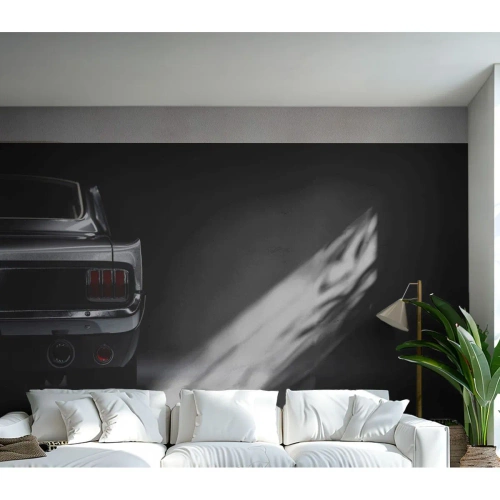 Fototapete Premium Sand - Ikonisches schwarzes Auto vor dem Hintergrund einer dunklen Garage - 100x70cm - Charme des Klassikers - Moderne Wanddekoration für Wohnzimmer und Schlafzimmer ARTTOR