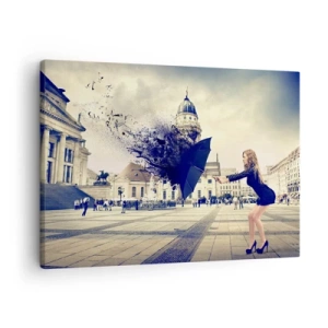 Bild auf Leinwand - Leinwandbild - Eine Frau mit Regenschirm in einer künstlerischen Komposition vor urbanem Hintergrund - 70x50cm - Es weht so ein Wind ... - Moderne Wanddekoration für Wohnzimmer und Schlafzimmer ARTTOR