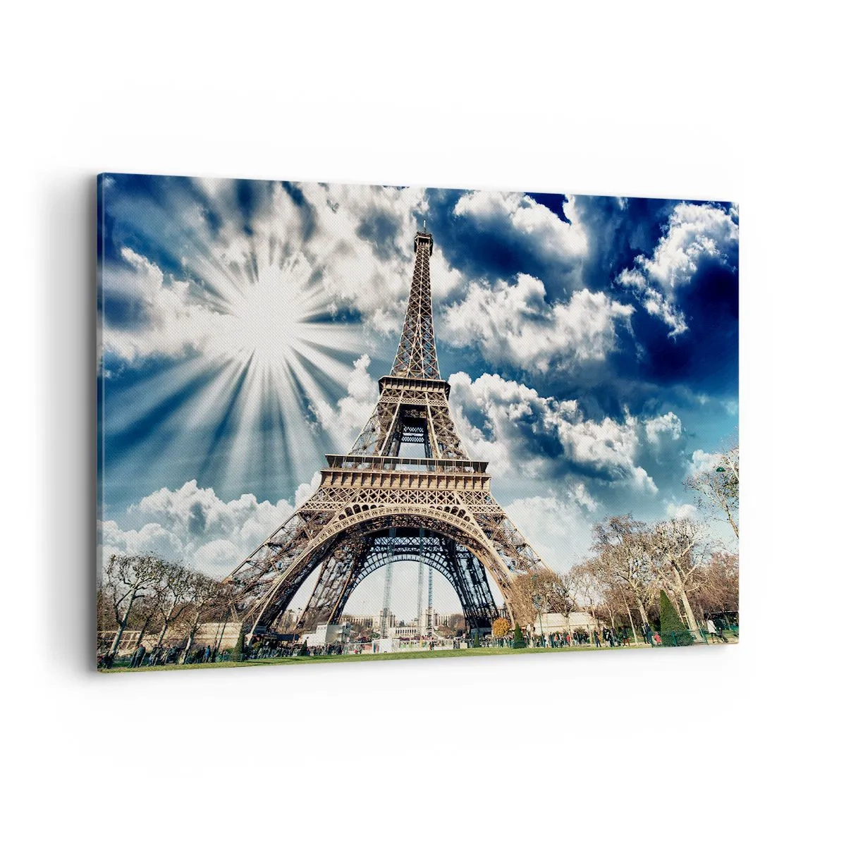 Bild auf Leinwand - Leinwandbild - Der Eiffelturm vor einem sonnigen Himmel mit Wolken - 120x80cm - Die Einzige unter der Sonne - Moderne Wanddekoration für Wohnzimmer und Schlafzimmer ARTTOR