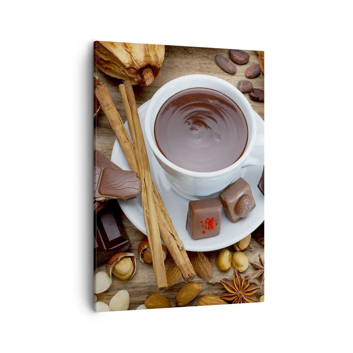 Bild auf Leinwand - Leinwandbild - Eine Tasse heiße Schokolade, umgeben von Dessertzutaten - 50x70cm - Aus einer märchenhaften Schokoladenfabrik - Moderne Wanddekoration für Wohnzimmer und Schlafzimmer ARTTOR