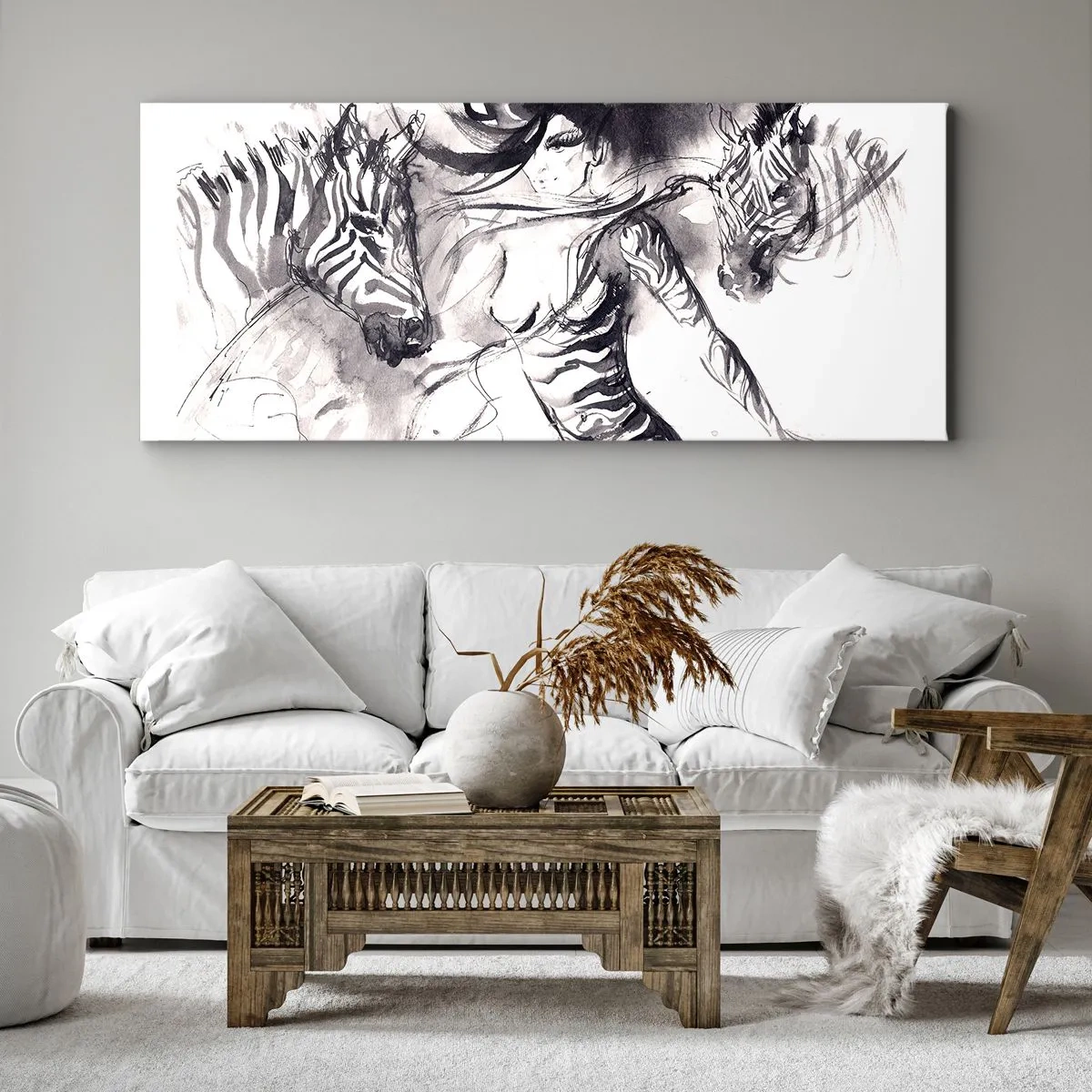 Bild auf Leinwand - Leinwandbild - Eine Frau in einem dynamischen Tanz mit Zebras in einer Schwarz-Weiß-Ästhetik - 140x50cm - Tanzen mit den Zebras - Moderne Wanddekoration für Wohnzimmer und Schlafzimmer ARTTOR