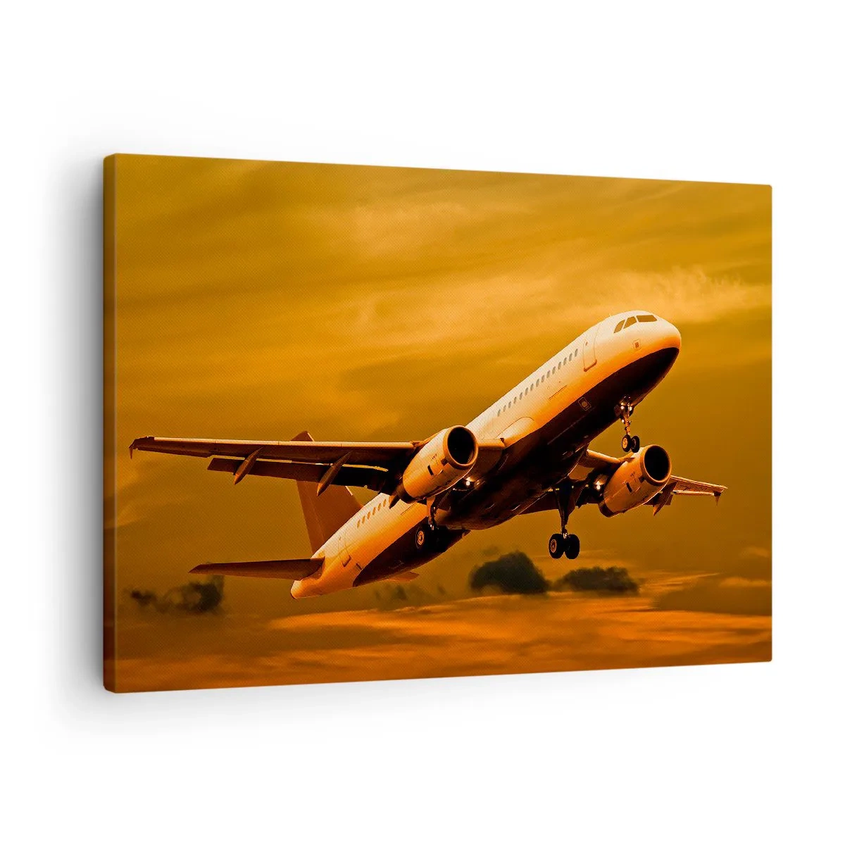 Bild auf Leinwand - Leinwandbild - Ein Passagierflugzeug hebt vor einem goldenen Sonnenuntergangshimmel ab. - 70x50cm - Flug der Sonne entgegen - Moderne Wanddekoration für Wohnzimmer und Schlafzimmer ARTTOR
