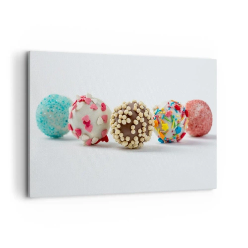 Bild auf Leinwand - Leinwandbild - Bunte Pralinen mit Dekorationen auf weißem Hintergrund - 120x80cm - Das Leben kann süß sein - Moderne Wanddekoration für Wohnzimmer und Schlafzimmer ARTTOR