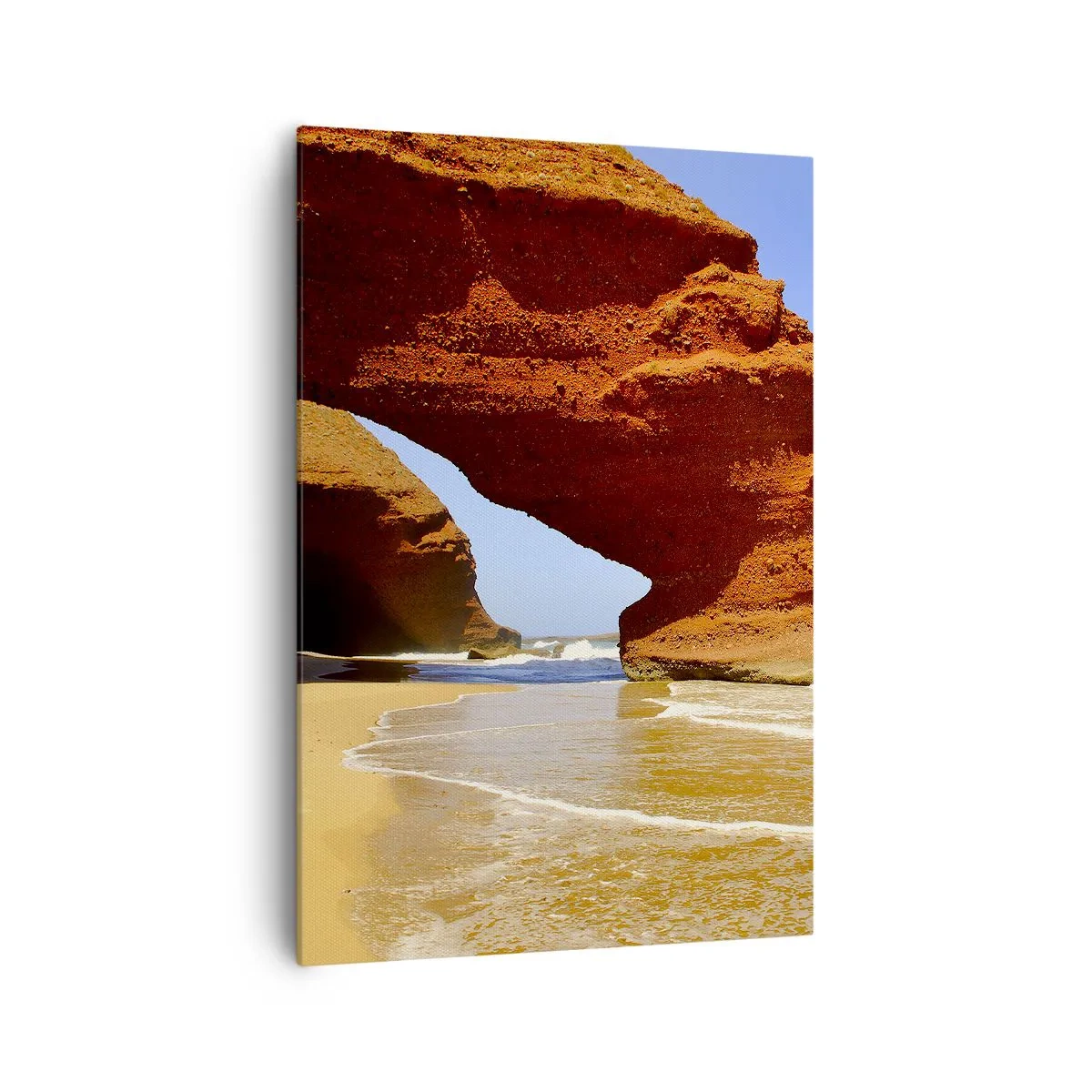 Bild auf Leinwand - Leinwandbild - Ein natürlicher Felsbogen an einem Strand mit blauem Himmel und Wellen - 70x100cm - Wasser und Wind seit Tausenden von Jahren - Moderne Wanddekoration für Wohnzimmer und Schlafzimmer ARTTOR
