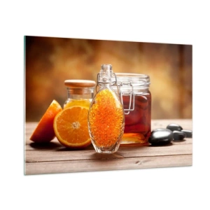 Glasbild - Bild auf glas - Eine Flasche Öl und eine Orange auf einem Holztisch - 100x70cm - Sonnige Aromen und Düfte - Moderne Wanddekoration für Wohnzimmer und Schlafzimmer ARTTOR