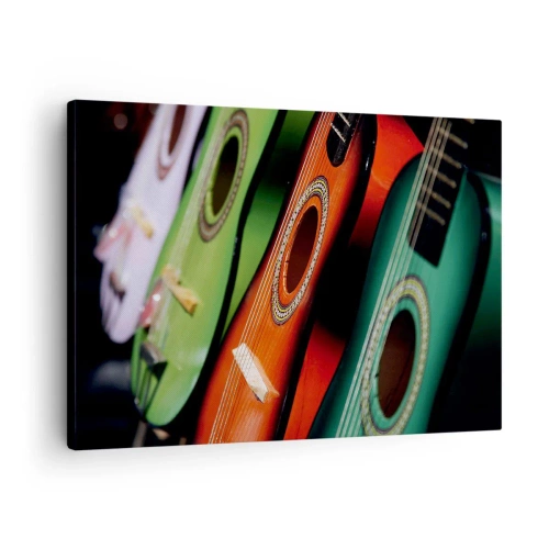 Bild auf Leinwand - Leinwandbild - Bunte Gitarren in verschiedenen Farbtönen in einer Reihe angeordnet - 70x50cm - Die Gitarre hat viele Farben - Moderne Wanddekoration für Wohnzimmer und Schlafzimmer ARTTOR
