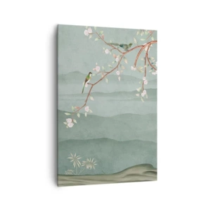 Bild auf Leinwand - Leinwandbild - Ein malerisches Bild eines blühenden Baumzweigs mit Vögeln vor dem Hintergrund grüner Hügel. - 70x100cm - Frühling, oh, du bist es - Moderne Wanddekoration für Wohnzimmer und Schlafzimmer ARTTOR