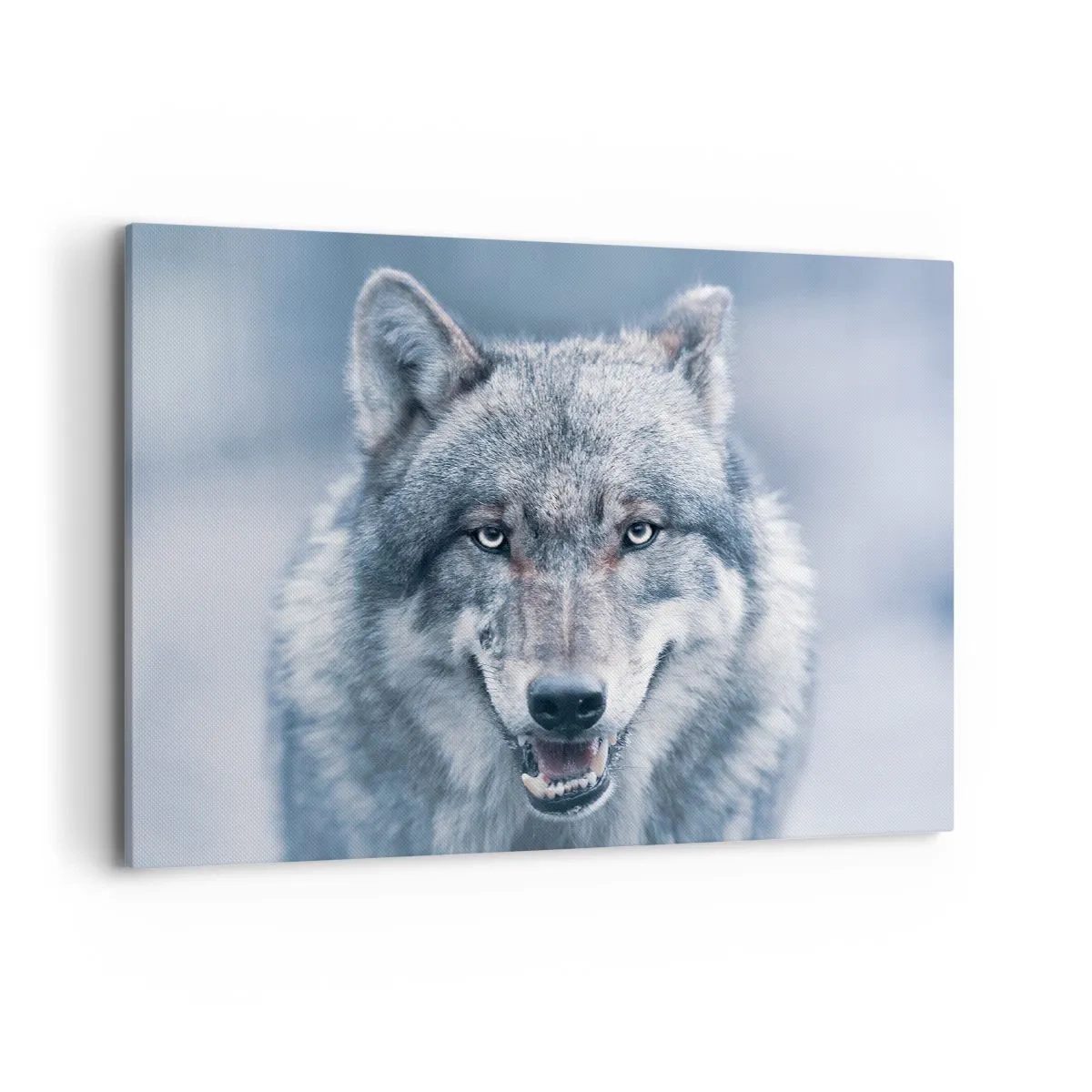Bild auf Leinwand - Leinwandbild - Ein Wolf mit intensivem Blick in einer Winterlandschaft - 100x70cm - Werden Sie die Herausforderung annehmen? - Moderne Wanddekoration für Wohnzimmer und Schlafzimmer ARTTOR