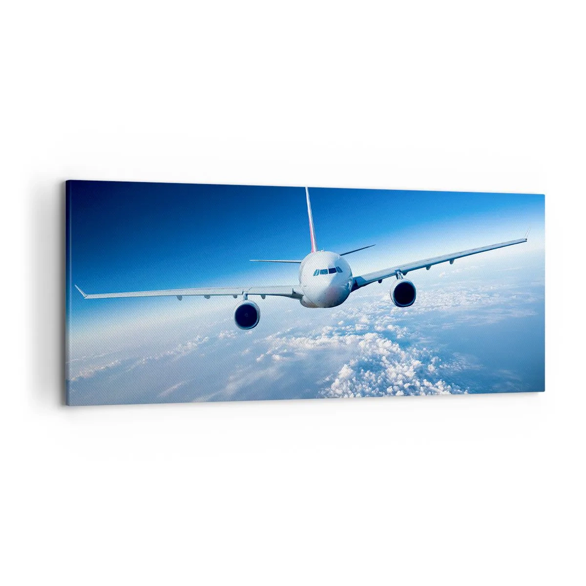 Bild auf Leinwand - Leinwandbild - Ein Flugzeug fliegt über den Wolken vor blauem Himmel - 120x50cm - Ich fliege, weil ich es kann - Moderne Wanddekoration für Wohnzimmer und Schlafzimmer ARTTOR