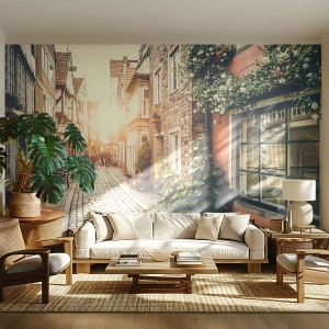 Fototapete Premium Sand - Eine historische Straße im Schein der untergehenden Sonne - 100x70cm - Rosenallee im rosa Schein - Moderne Wanddekoration für Wohnzimmer und Schlafzimmer ARTTOR