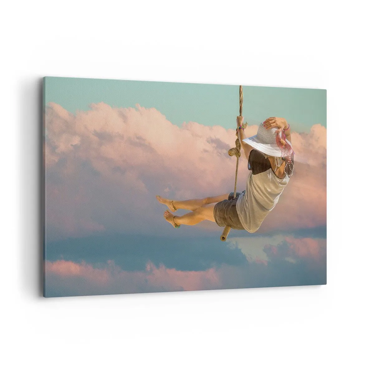 Bild auf Leinwand - Leinwandbild - Frau auf einer Schaukel zwischen rosa Wolken - 120x80cm - Spaß in den Wolken - Moderne Wanddekoration für Wohnzimmer und Schlafzimmer ARTTOR