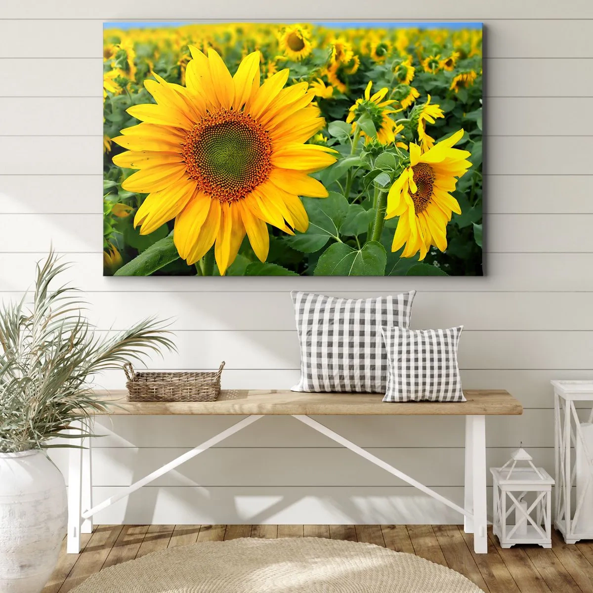 Bild auf Leinwand - Leinwandbild - Ein Feld mit Sonnenblumen und gelben Blüten vor einem Hintergrund aus grünen Blättern - 100x70cm - Hunderte von Sonnen flammten auf - Moderne Wanddekoration für Wohnzimmer und Schlafzimmer ARTTOR