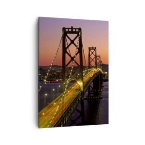 Bild auf Leinwand - Leinwandbild - Eine nachts beleuchtete Brücke über dem Wasser mit Panoramablick auf die Stadt - 50x70cm - Violetter Abend - Moderne Wanddekoration für Wohnzimmer und Schlafzimmer ARTTOR