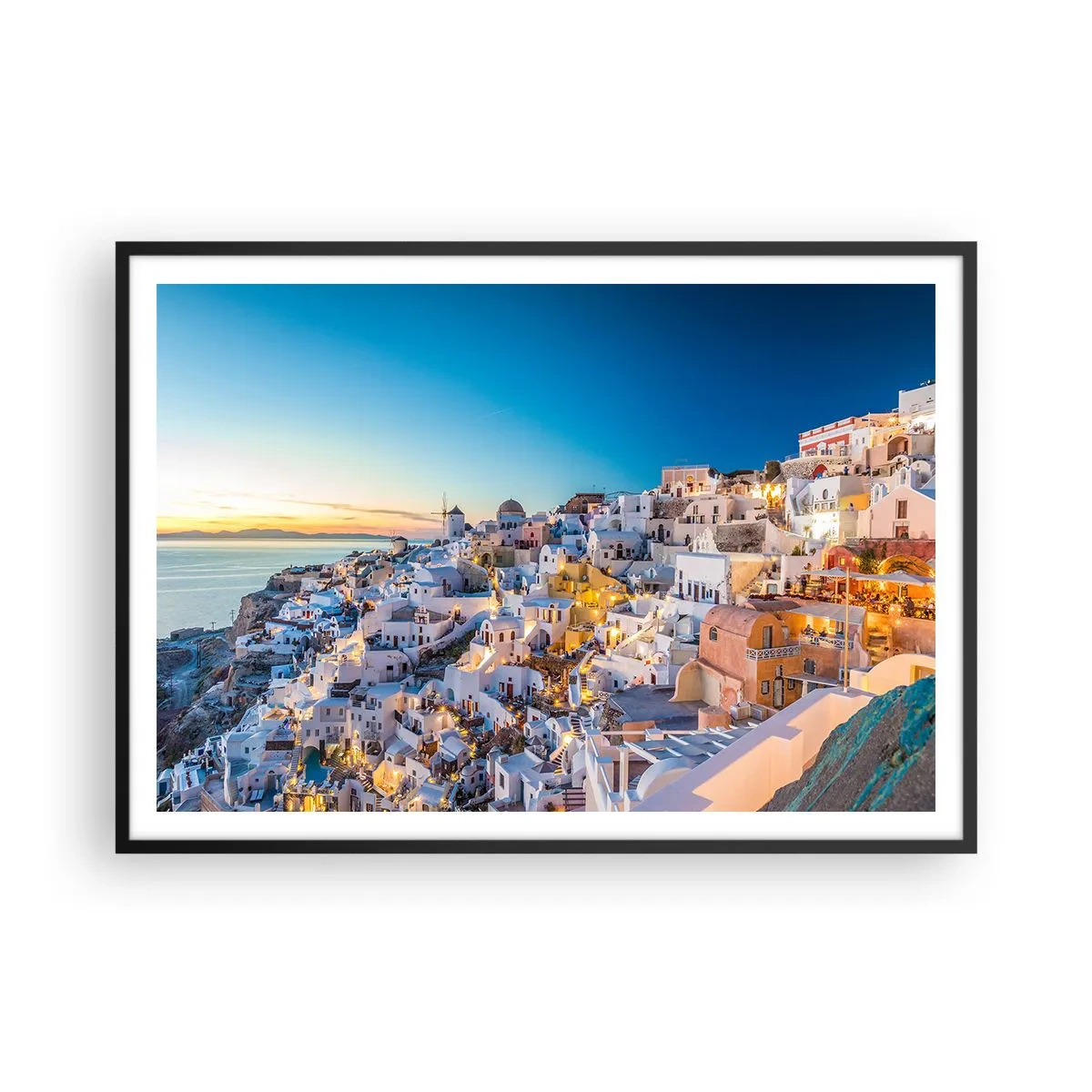 Poster in einem schwarzem Rahmen - Blick auf eine griechische Stadt bei Sonnenuntergang - 100x70cm - Die Essenz des Griechischen - Moderne Wanddekoration für Wohnzimmer und Schlafzimmer ARTTOR