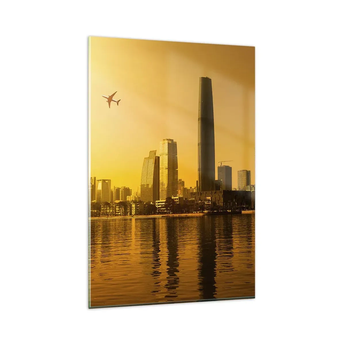 Glasbild - Bild auf glas - Stadtpanorama bei Sonnenuntergang mit Wolkenkratzern und einem Flugzeug - 80x120cm - Die goldene Stadt - Moderne Wanddekoration für Wohnzimmer und Schlafzimmer ARTTOR