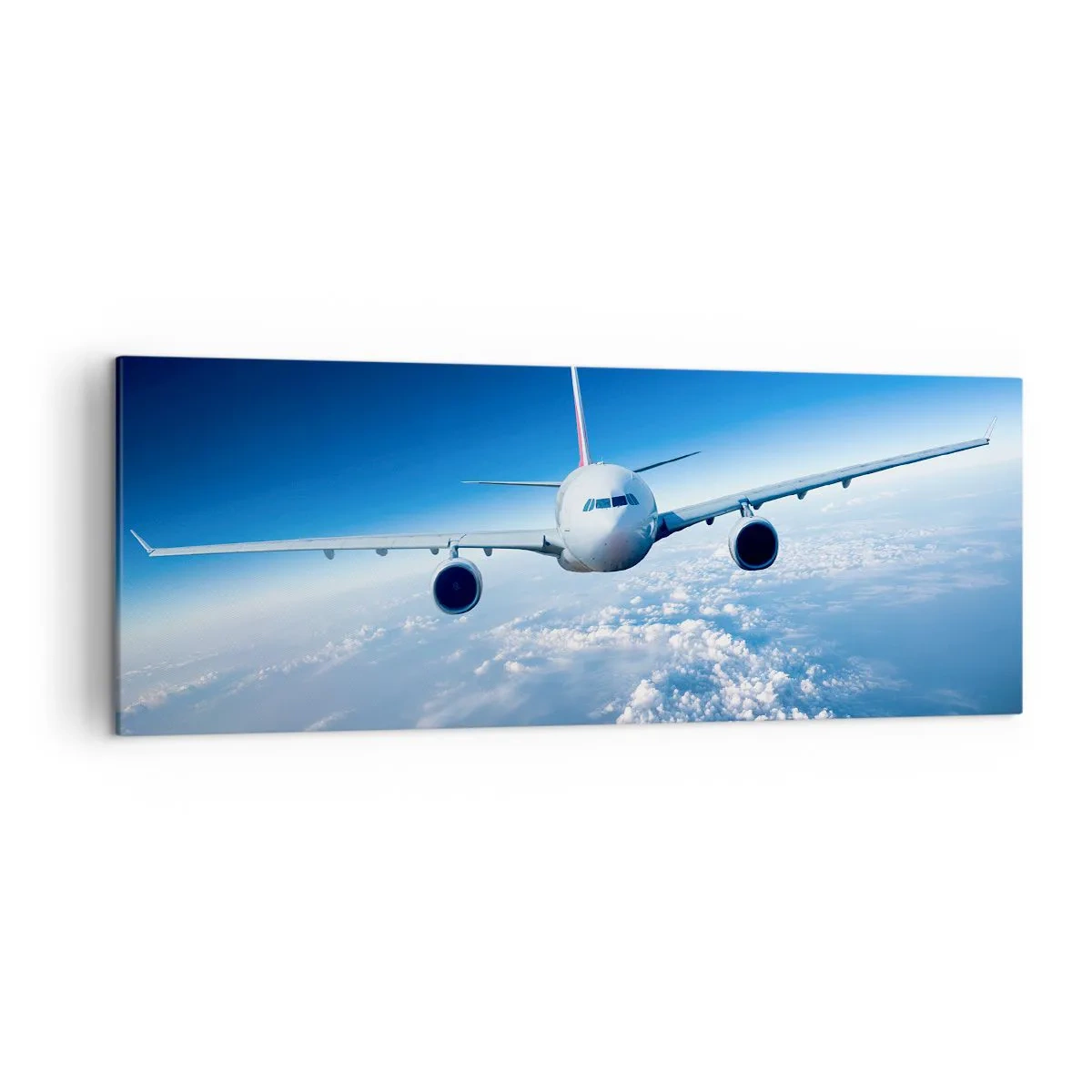 Bild auf Leinwand - Leinwandbild - Ein Flugzeug fliegt über den Wolken vor blauem Himmel - 140x50cm - Ich fliege, weil ich es kann - Moderne Wanddekoration für Wohnzimmer und Schlafzimmer ARTTOR