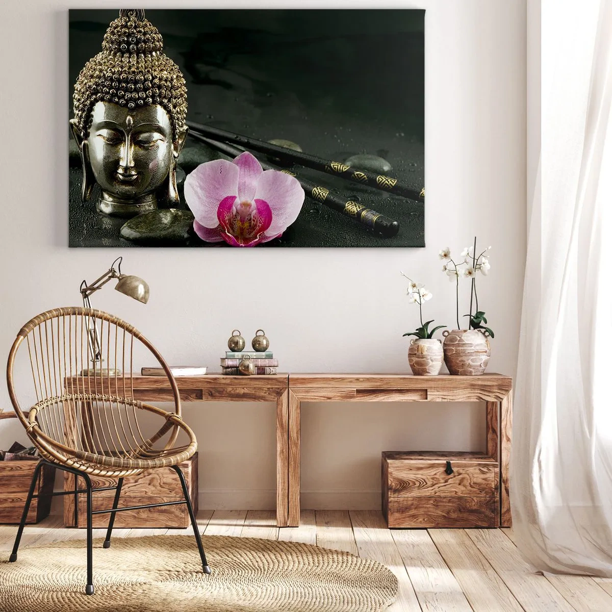 Bild auf Leinwand - Leinwandbild - Eine Buddha-Statuette mit Orchidee und Essstäbchen vor einem Hintergrund aus Steinen - 100x70cm - Harmonie von Weisheit und Schönheit - Moderne Wanddekoration für Wohnzimmer und Schlafzimmer ARTTOR