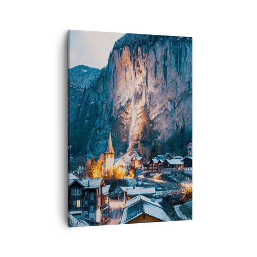 Bild auf Leinwand - Leinwandbild - Ein malerisches Winterdorf, umgeben von Bergen - 50x70cm - Der leuchtende Geist des Winters - Moderne Wanddekoration für Wohnzimmer und Schlafzimmer ARTTOR