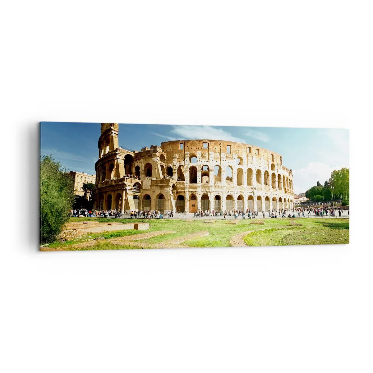 Bild auf Leinwand - Leinwandbild - Das Kolosseum in Rom, umgeben von Grün und blauem Himmel - 140x50cm - Wir können immer noch das Knallen der Waffe hören - Moderne Wanddekoration für Wohnzimmer und Schlafzimmer ARTTOR