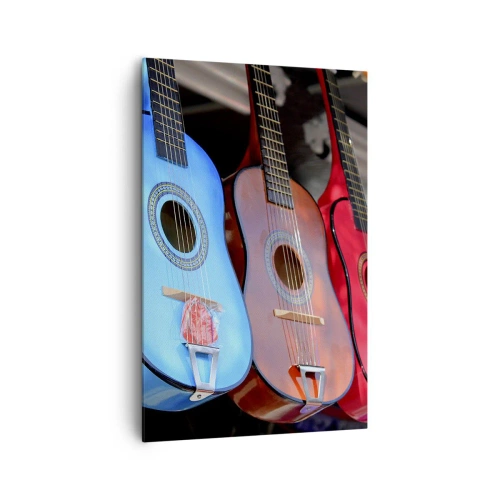 Bild auf Leinwand - Leinwandbild - Bunte Akustikgitarren hängen in einer Reihe auf dem Display - 80x120cm - Lateinische Atmosphäre - Moderne Wanddekoration für Wohnzimmer und Schlafzimmer ARTTOR