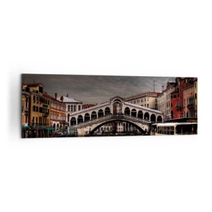Bild auf Leinwand - Leinwandbild - Rialtobrücke in Venedig über den Canal Grande, klassische Architektur. - 160x50cm - Das Versprechen eines venezianischen Abends - Moderne Wanddekoration für Wohnzimmer und Schlafzimmer ARTTOR