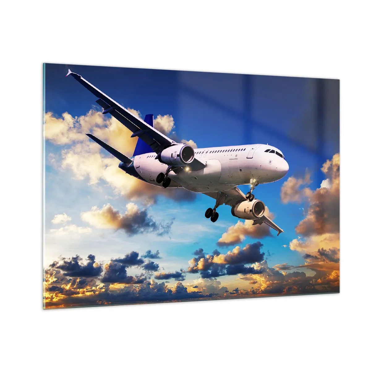 Glasbild - Bild auf glas - Ein Flugzeug im Flug vor einem malerischen Himmel - 100x70cm - Eine Reise in Weiß und Blau - Moderne Wanddekoration für Wohnzimmer und Schlafzimmer ARTTOR
