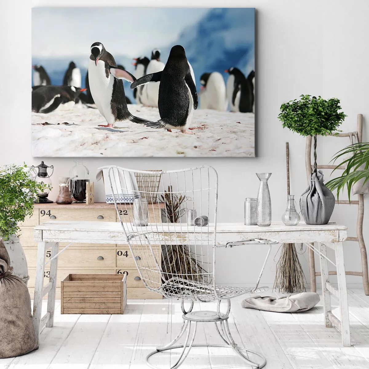 Bild auf Leinwand - Leinwandbild - Eine Gruppe Pinguine im Schnee in einer antarktischen Landschaft - 100x70cm - Tanzen im Schnee - Moderne Wanddekoration für Wohnzimmer und Schlafzimmer ARTTOR