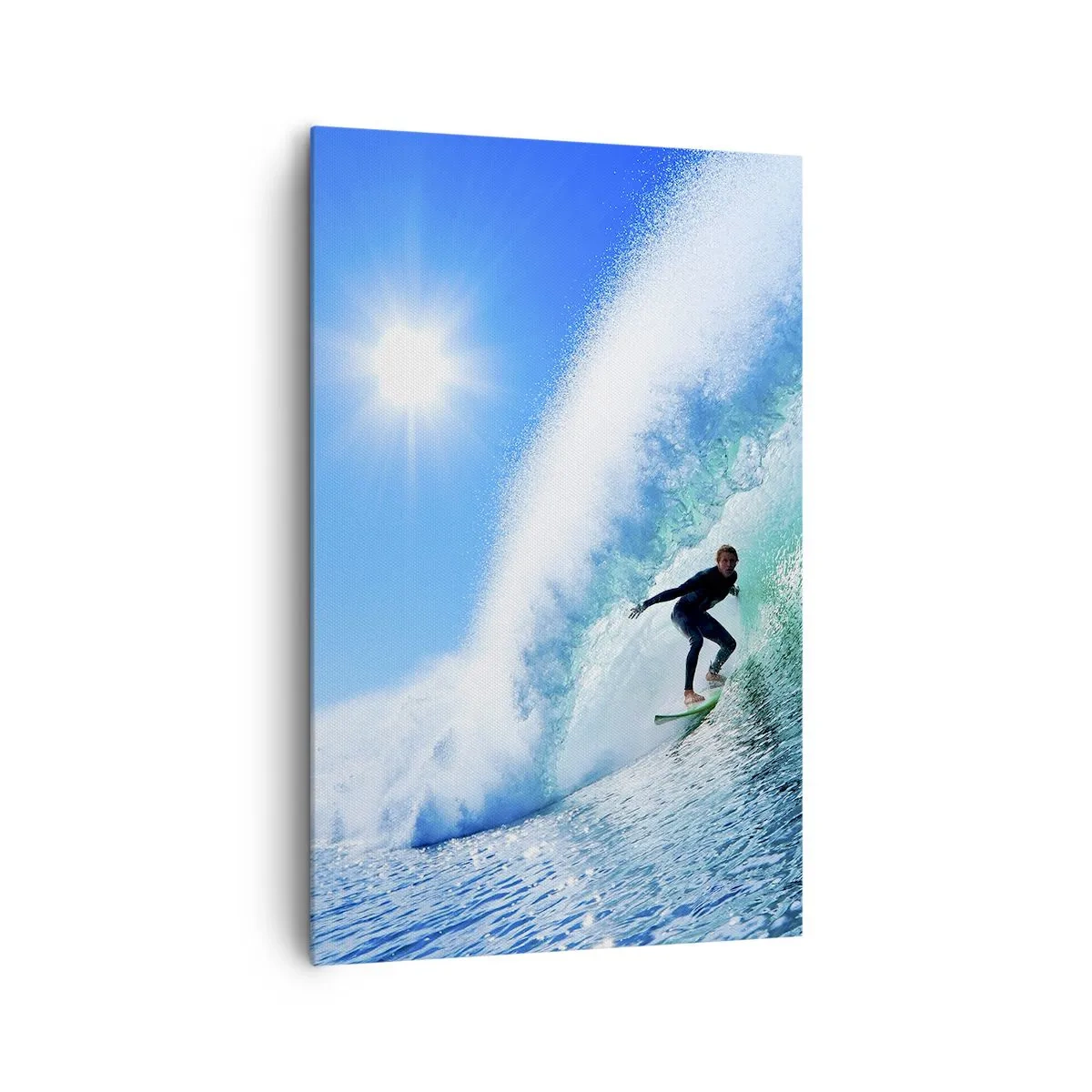 Bild auf Leinwand - Leinwandbild - Ein Surfer auf einem Brett reitet unter blauem Himmel auf einer starken Welle. - 80x120cm - Durch das große Blau - Moderne Wanddekoration für Wohnzimmer und Schlafzimmer ARTTOR