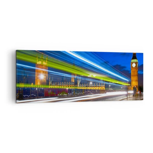 Bild auf Leinwand - Leinwandbild - Big Ben bei Nacht mit der Wirkung von Lichtern im Straßenverkehr - 140x50cm - Unter den wachsamen Augen von Big Ben - Moderne Wanddekoration für Wohnzimmer und Schlafzimmer ARTTOR