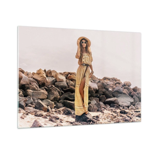 Glasbild - Bild auf glas - Eine Frau in einem Kleid im Boho-Stil vor einer felsigen Küste - 100x70cm - Die Magie der Steine - Moderne Wanddekoration für Wohnzimmer und Schlafzimmer ARTTOR