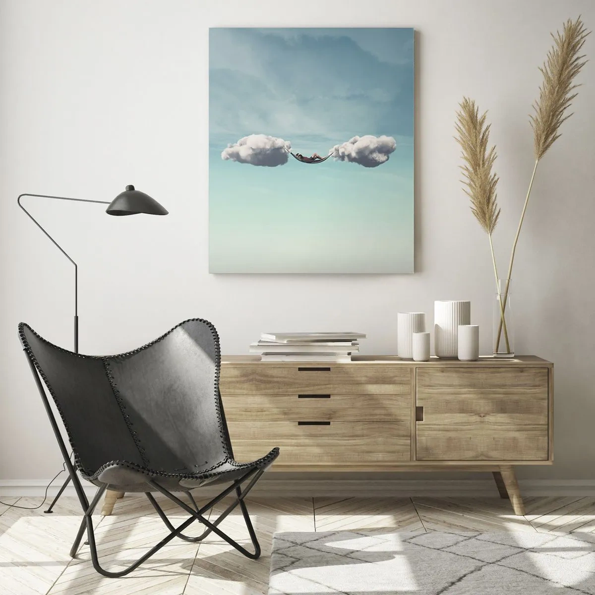 Glasbild - Bild auf glas - Eine Person entspannt in einer Hängematte in den Wolken - 70x100cm - Die Behaglichkeit des Augenblicks - Moderne Wanddekoration für Wohnzimmer und Schlafzimmer ARTTOR