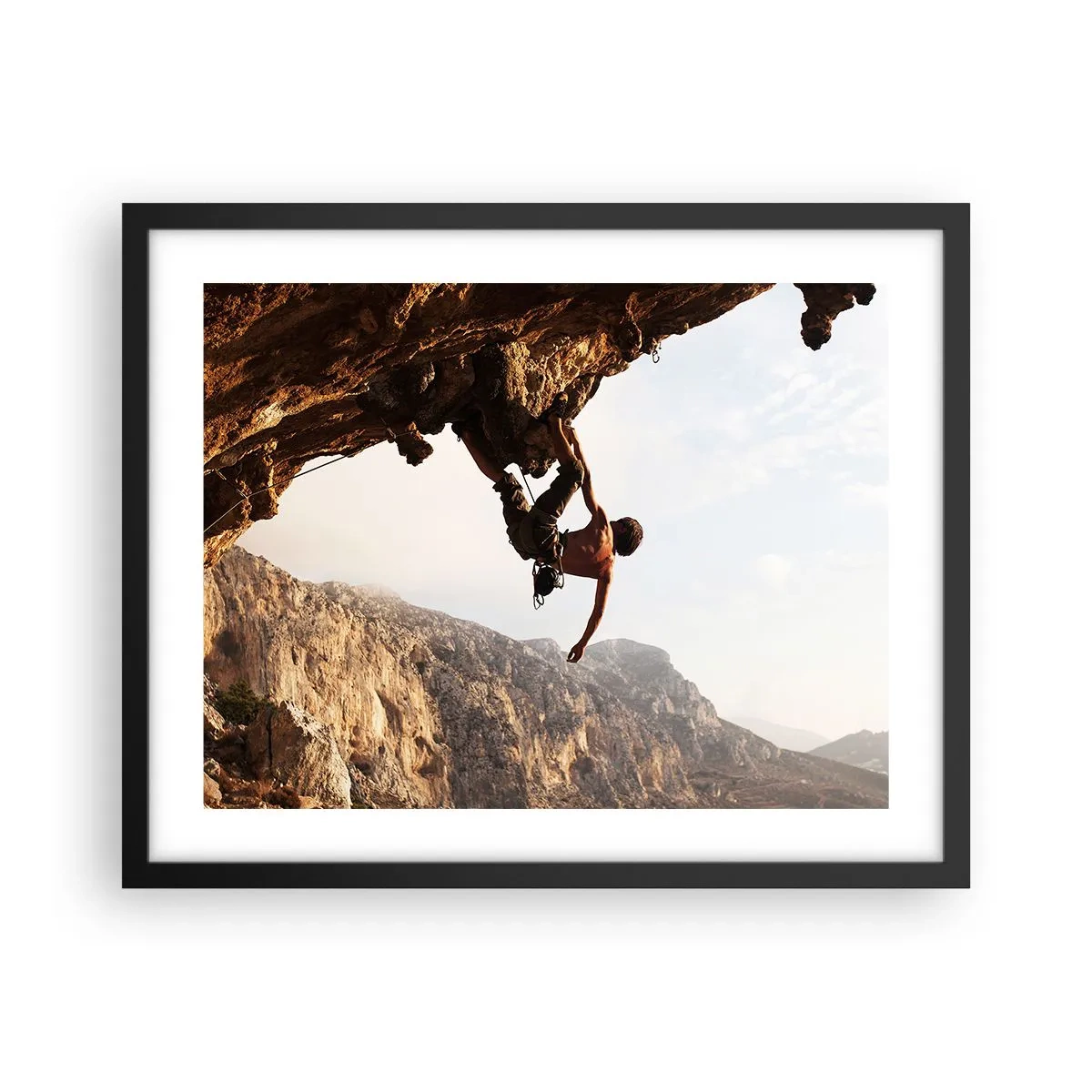 Poster in einem schwarzem Rahmen - Die Welt ist in einer Hand auf einem Felsblock geschrumpft - 50x40 cm