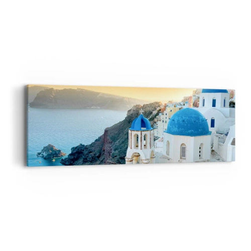 Bild auf Leinwand - Leinwandbild - Santorini - an die Felsen gekuschelt - 90x30 cm