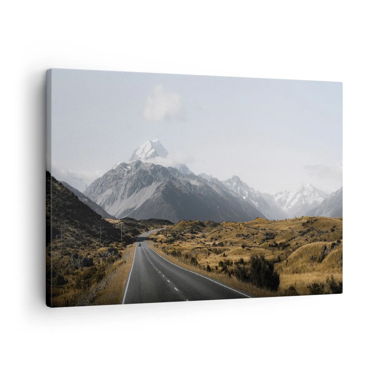 Bild auf Leinwand - Leinwandbild - Eine Straße in den Bergen, umgeben von einer malerischen Landschaft - 70x50cm - Der Weg ins Herz der Berge - Moderne Wanddekoration für Wohnzimmer und Schlafzimmer ARTTOR