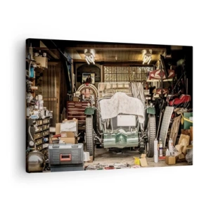 Bild auf Leinwand - Leinwandbild - Ein altes Auto in einer Garage, umgeben von Werkzeugen und Geräten - 70x50cm - Zurück in die Vergangenheit - Moderne Wanddekoration für Wohnzimmer und Schlafzimmer ARTTOR