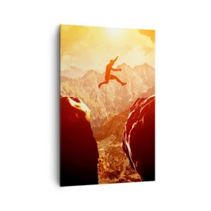 Bild auf Leinwand - Leinwandbild - Eine Figur springt zwischen Felsen mit Bergen im Hintergrund - 80x120cm - Grenzen überschreiten - Moderne Wanddekoration für Wohnzimmer und Schlafzimmer ARTTOR