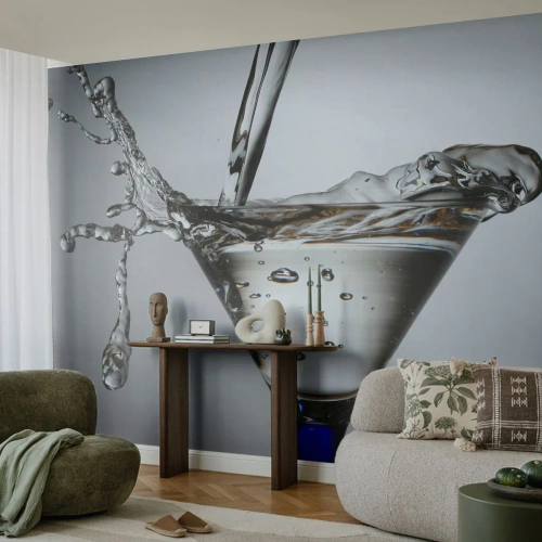 Fototapete Premium Sand - Wasser spritzt in ein Cocktailglas - 100x70cm - Am Rand der Tasse - Moderne Wanddekoration für Wohnzimmer und Schlafzimmer ARTTOR